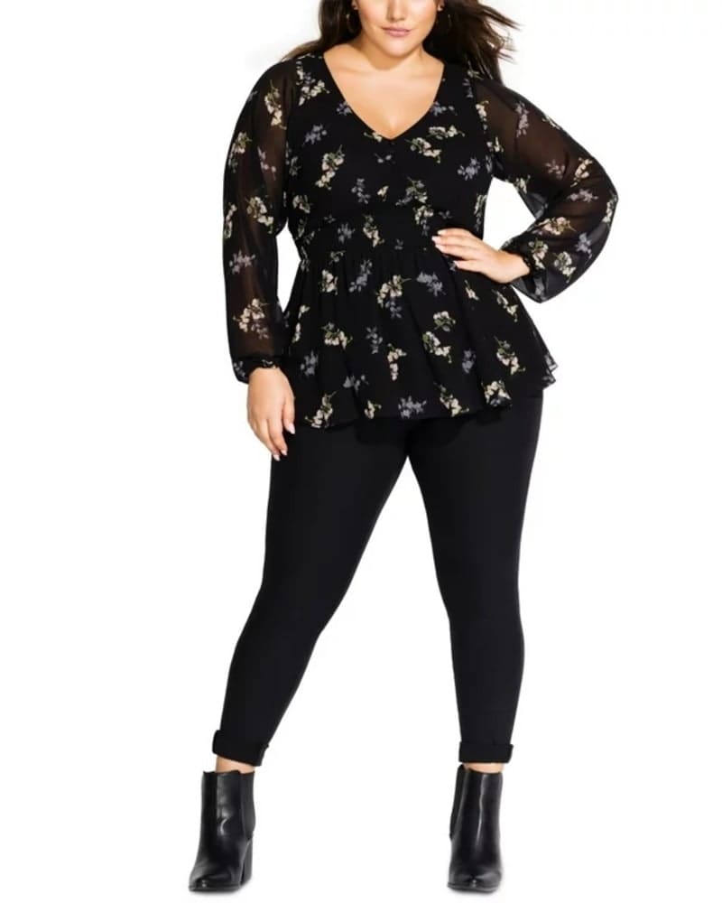 Front of a model wearing a size 24W City Chic Women's Trendy Plus Size Gental Floral-Print Peplum Top Black Size 24W in Black by City Chic. | dia_product_style_image_id:311095